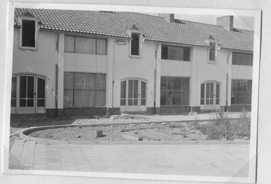 The white houses along the street